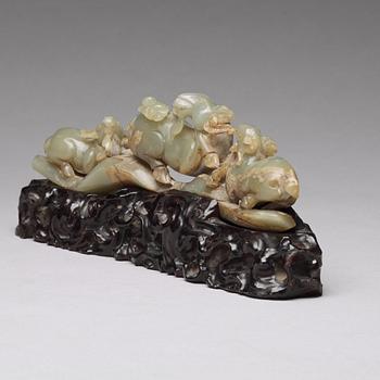 A Chinese nephrite sculpture of three rams.