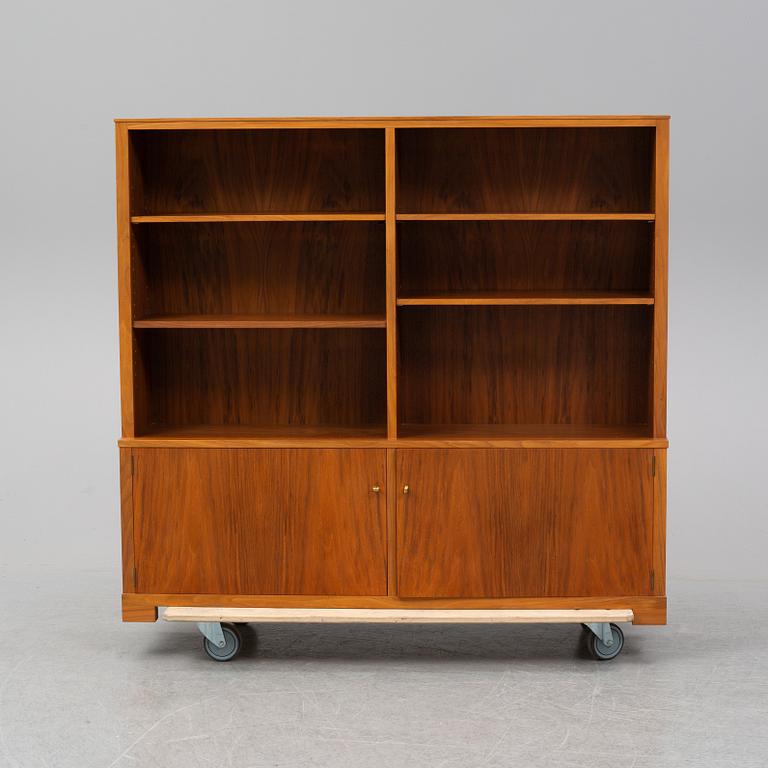 CARL MALMSTEN, a mahogany bookshelf.