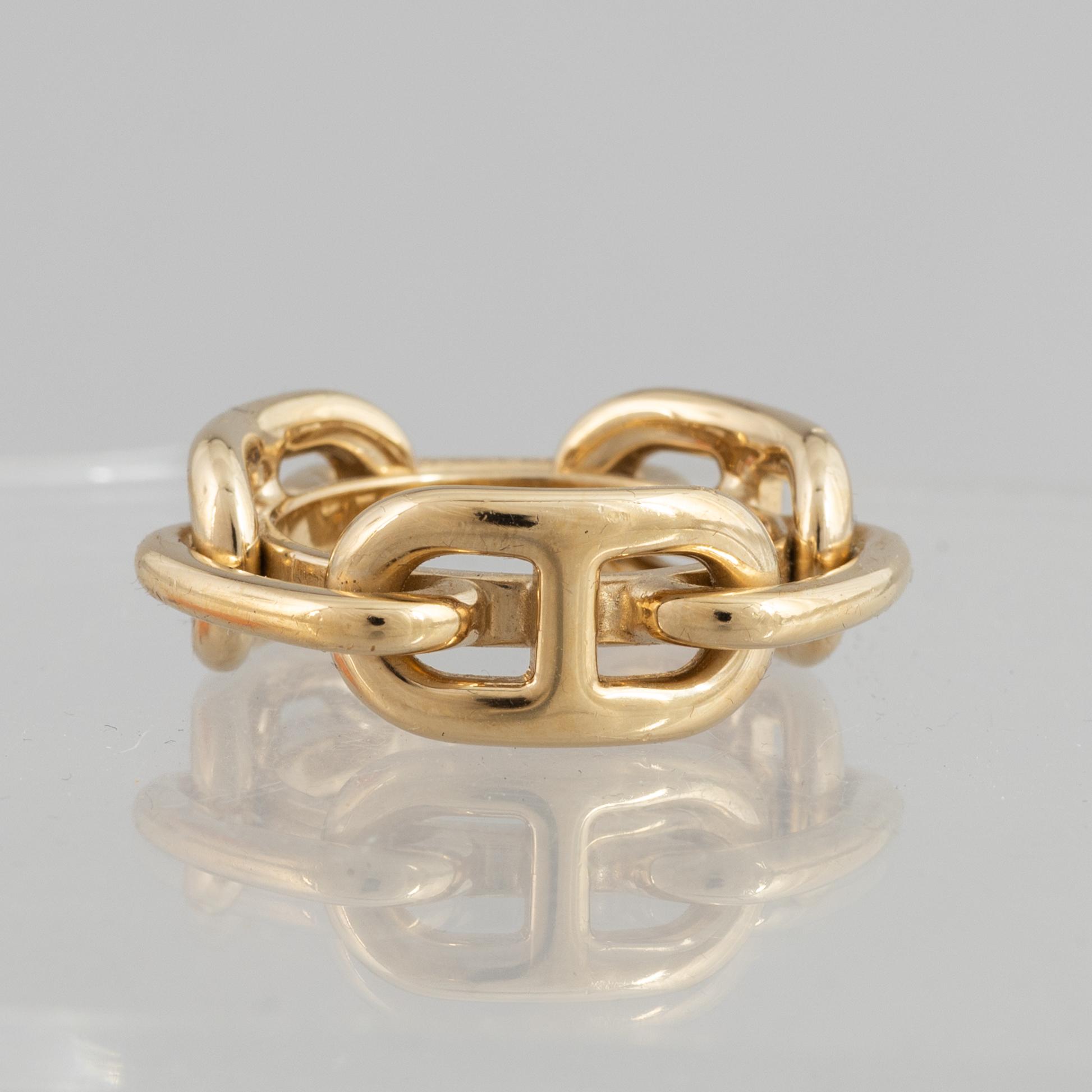 Hermès, a scarf ring.