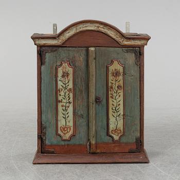 A 19th century painted cabinet.