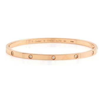 545. A Cartier "Love" bracelet small model in 18K rose gold with ten round brilliant-cut diamonds.