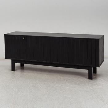 A late 20th Century painted sideboard.