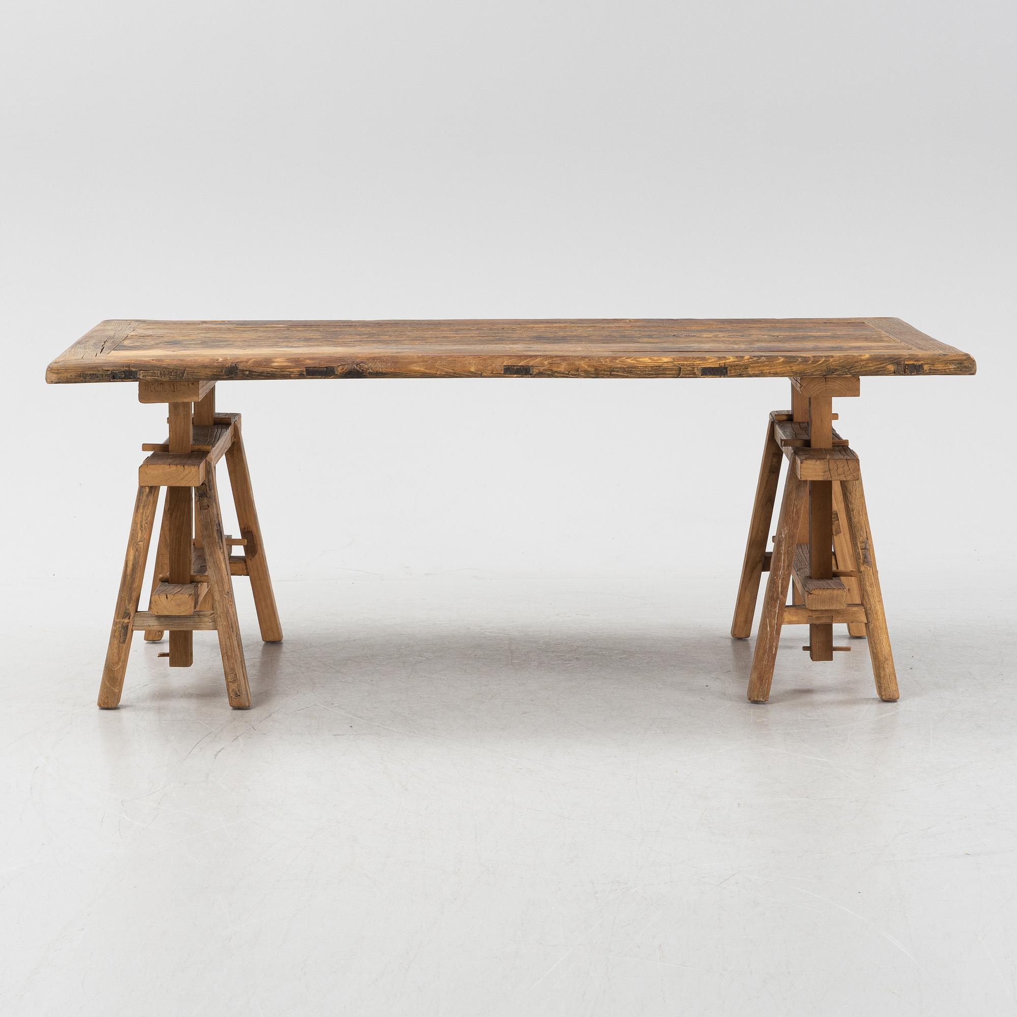 A Walles & Walles dining table.