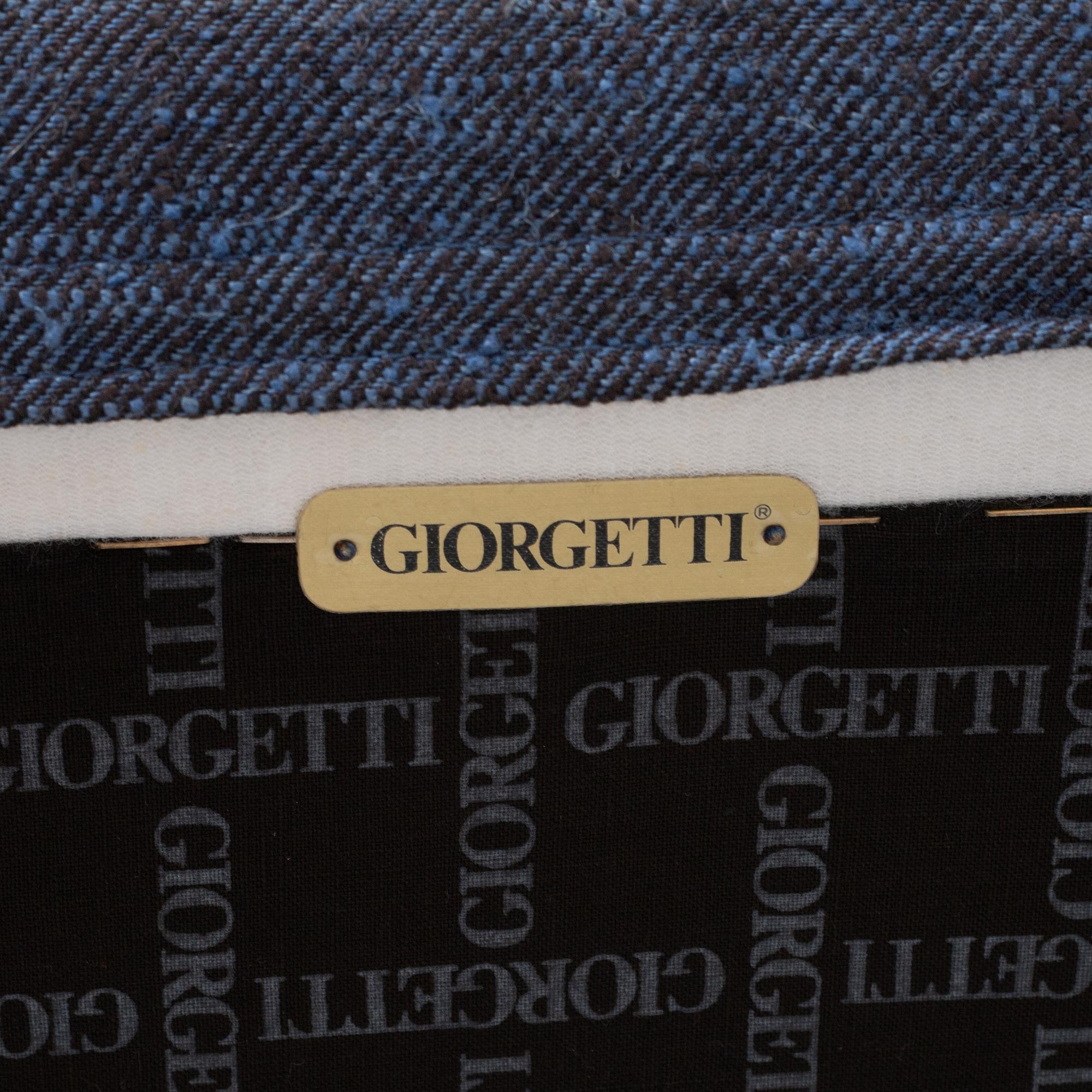Umberto Asnago, fåtölj med fotpall, "Progetti", Giorgetti, 2000-tal.