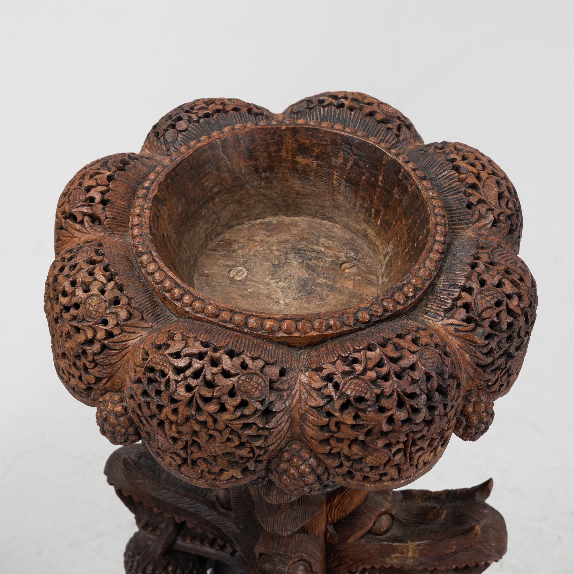 A South East Asian carved wooden piedestal,  20th Century.