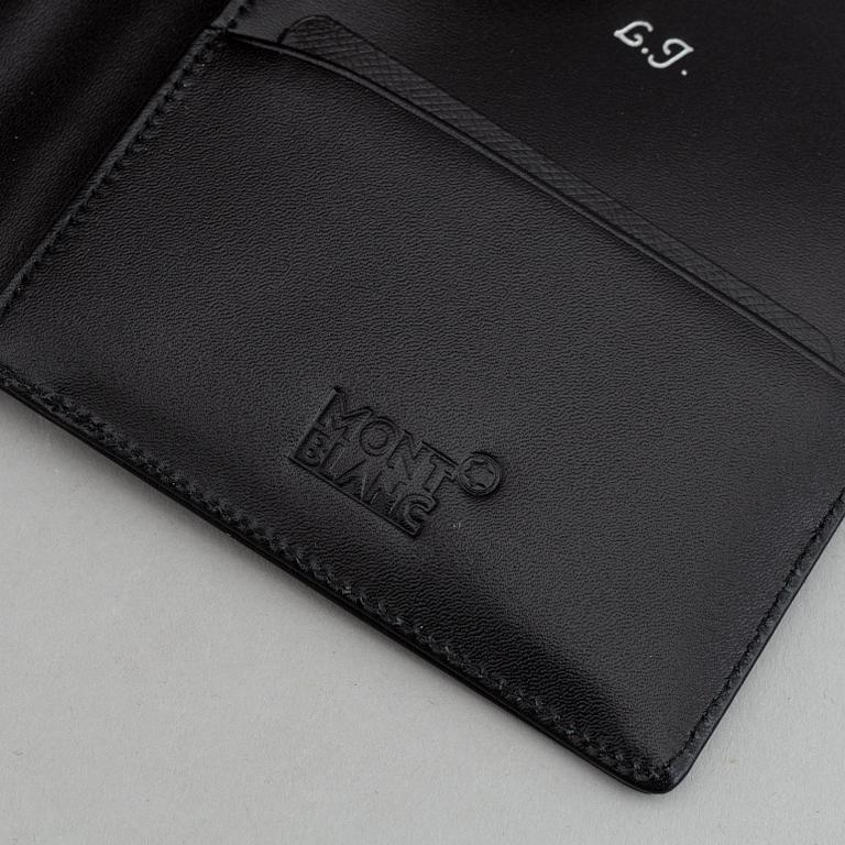 MOntblanc, a ball point pen and leather passport holder.