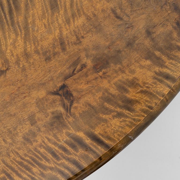 Dining table, circa 1900.