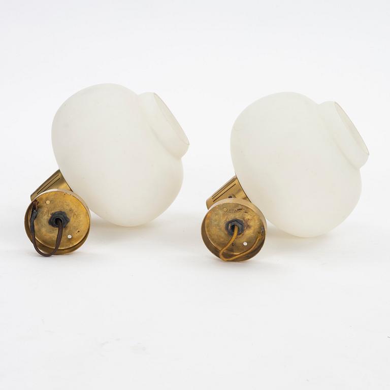Hans Bergström, a pair of wall lamps, model 338, ateljé Lyktan, Sweden, 1940-50s.