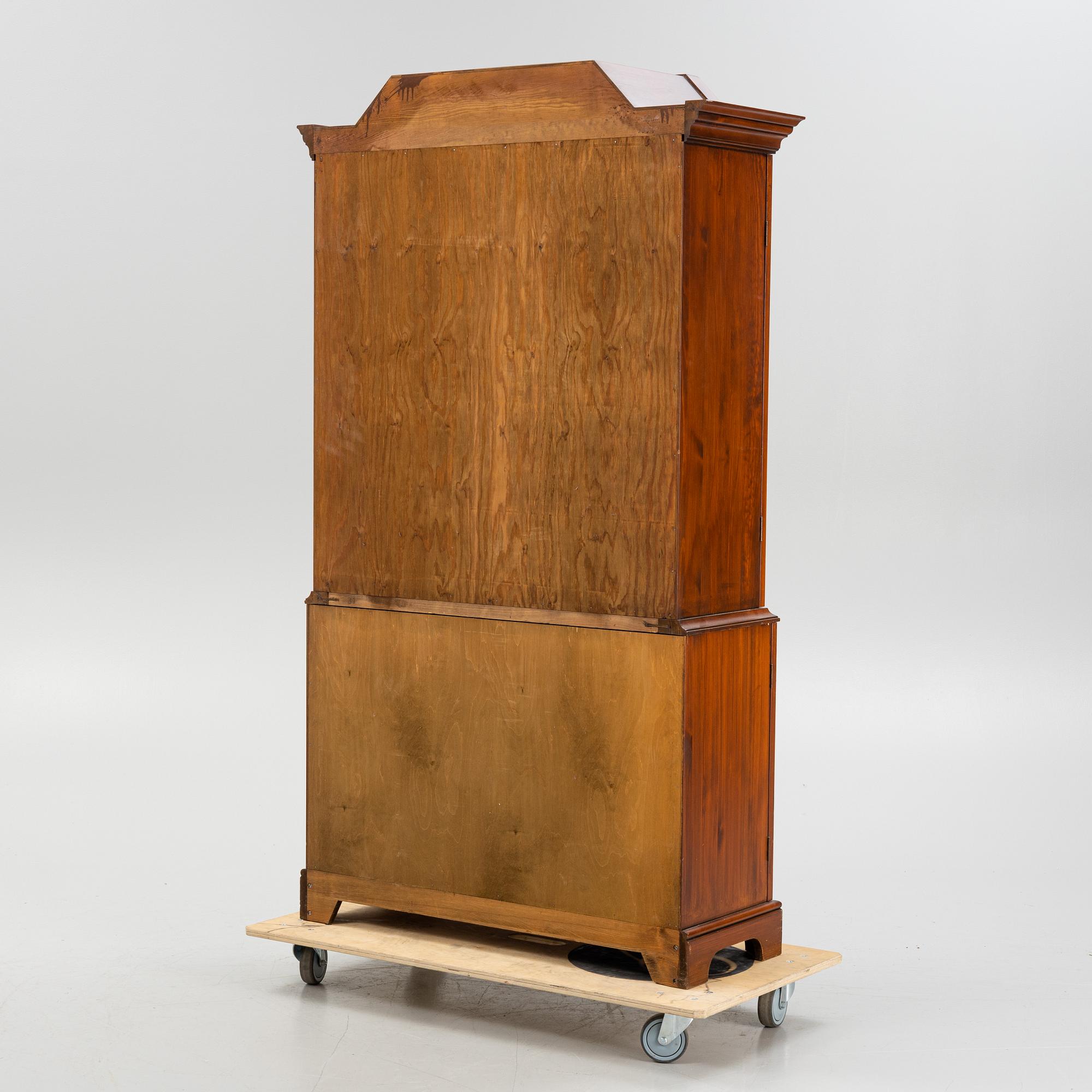 A vitrine cabinet from Åmells, dated 1974.