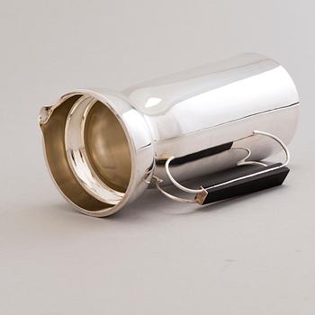 A 1960s silver jug with hardwood handle, Kultateollisuus, Turku Finland 1968.