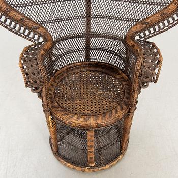 A rattan chair later part of the 20th century.