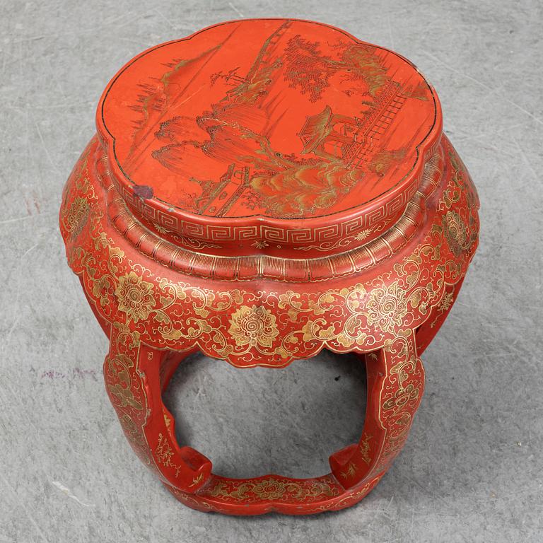 A Chinese red lacquered stool, early 20th century.