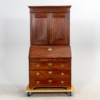 A late 18th century oak writing cabinet.