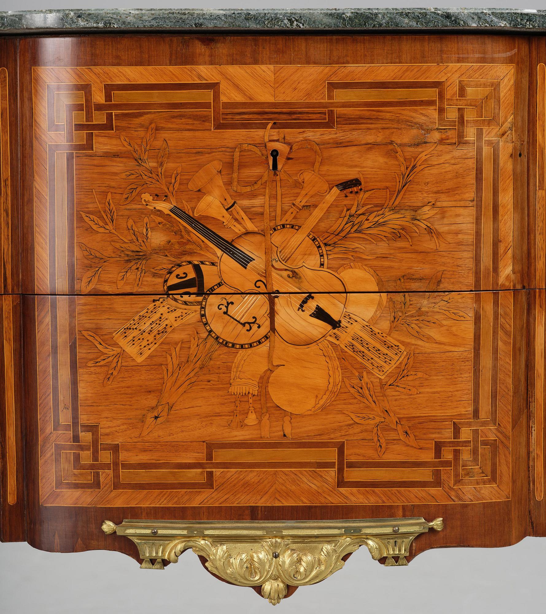 A Louis XVI rosewood and amaranth marquetry ormolu-mounted commode by Leonard Boudin (master in Paris 1761).
