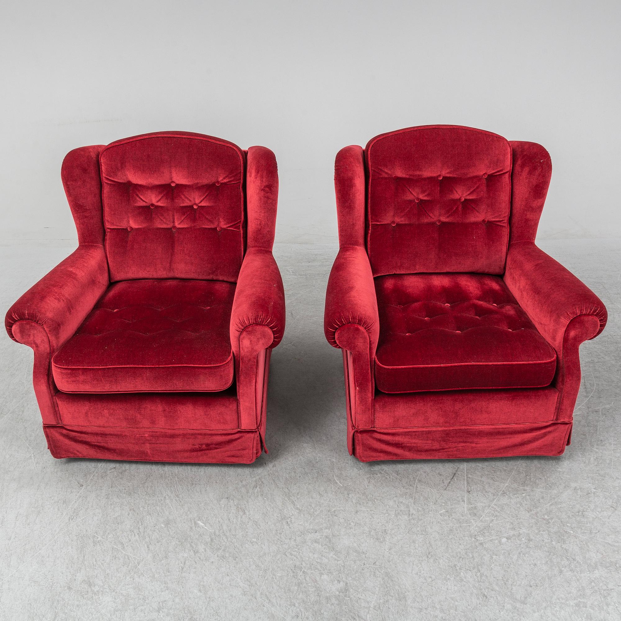 Apair of easy chairs.