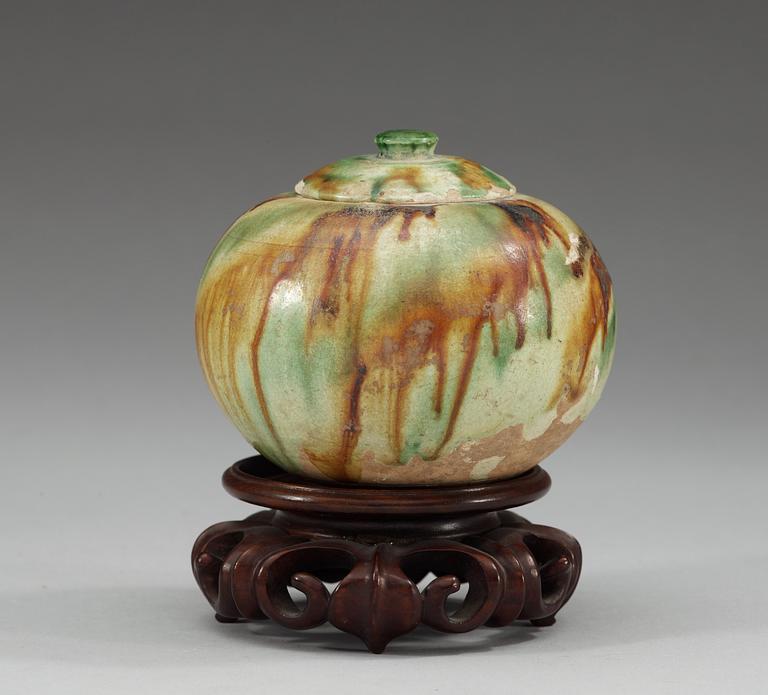A sancai glazed jar with cover, Tang dynasty (618-907 AD.).