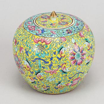 A yellow ground famille rose lotus jar, China, early 20th Century.