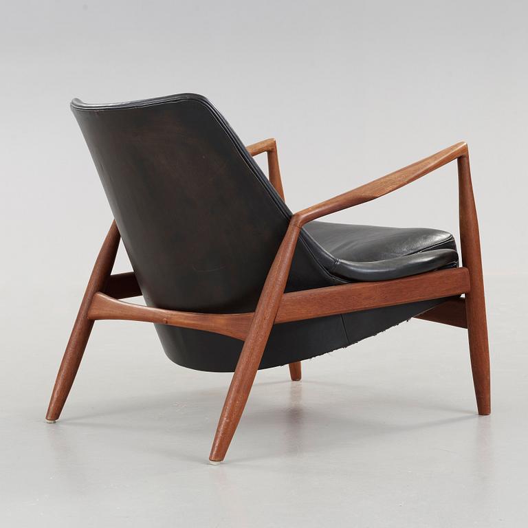 Ib Kofod-Larsen, a 'Seal' teak and black leather armchair, Olof Persson Möbler, Jönköping, Sweden 1950's-60's.