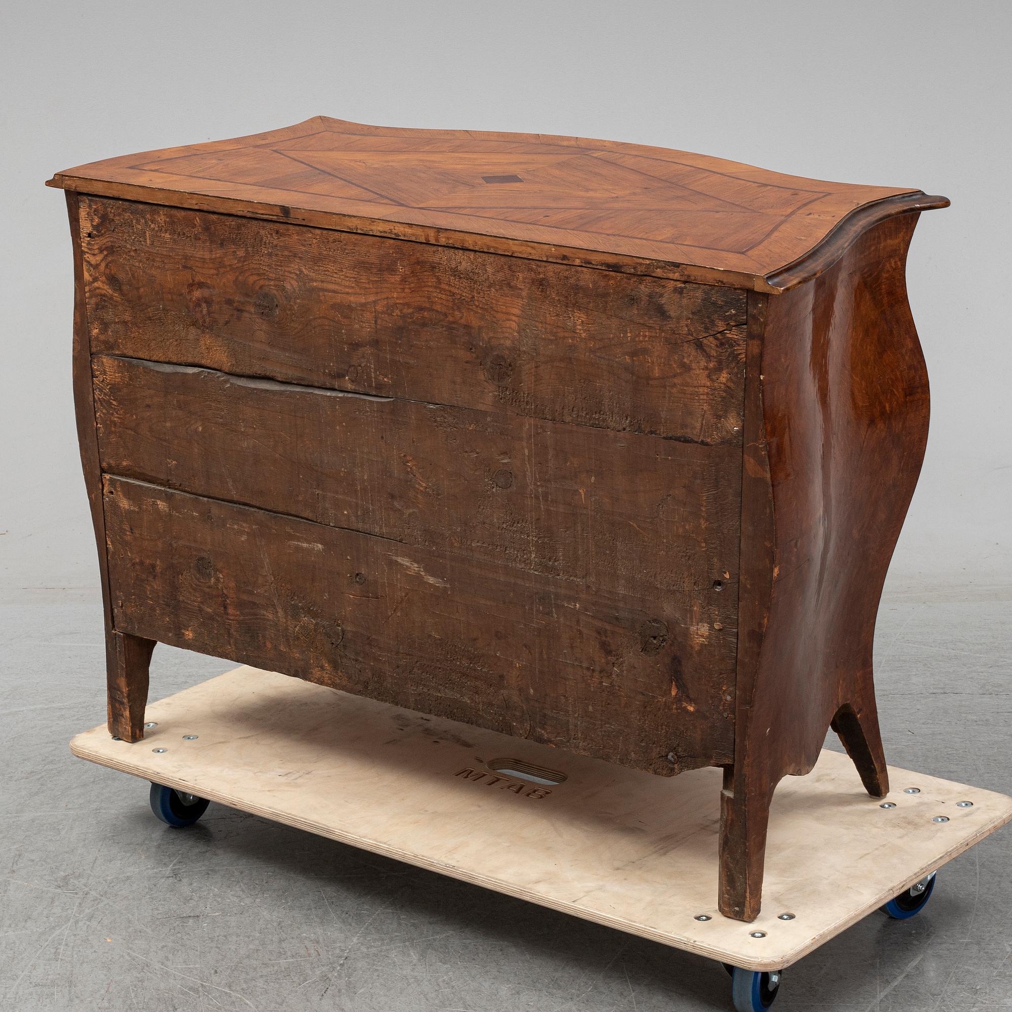 a mid 1700's rococo chest of drawers.