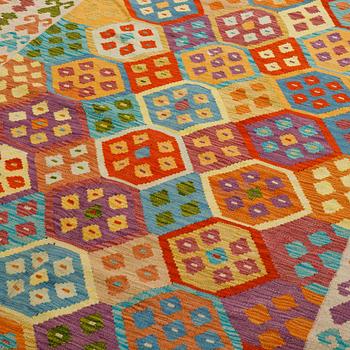 A carpet, kilim, ca 297 x 204 cm.