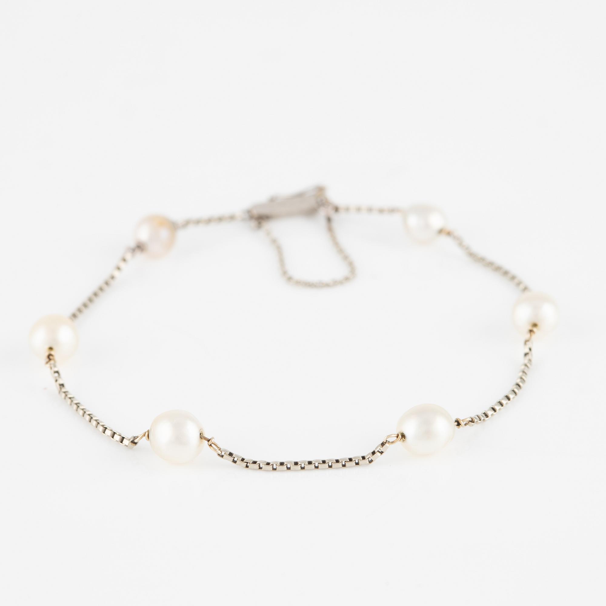 Armband, 18K guld med pärlor.