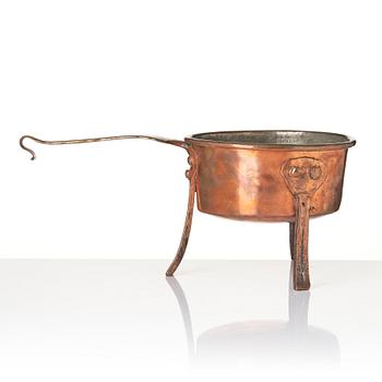 A copper saucepan, 18th century.