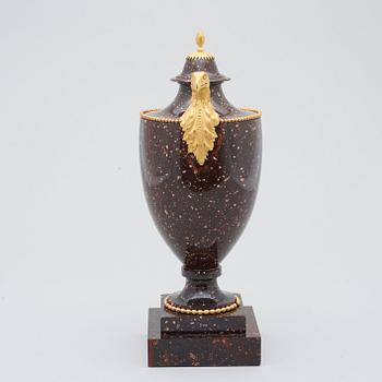 A Swedish late Gustavian 19th Century porphyry and gilt bronze urn.