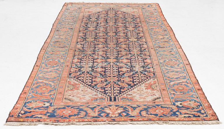 An antique Malayer carpet, west persia c 349 x 157 cm.