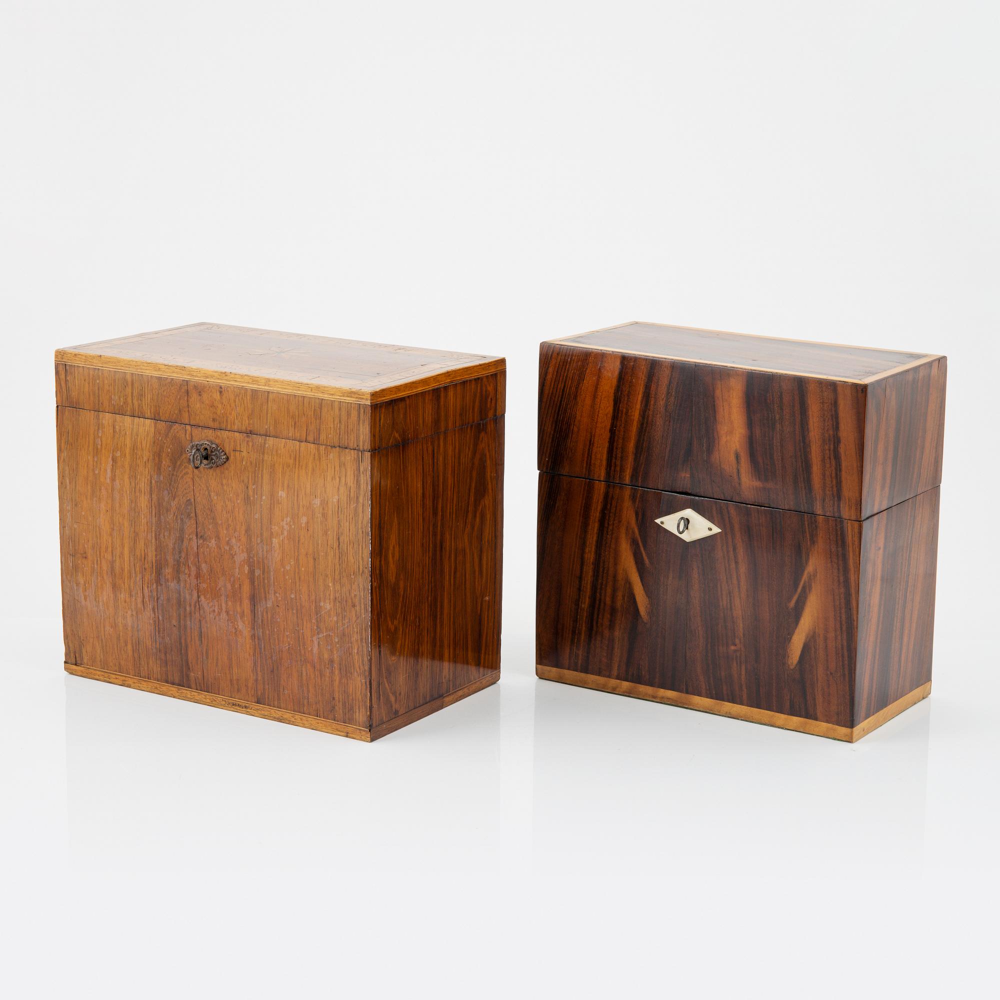 A set of two chests, one with four bottles, 20th Century.