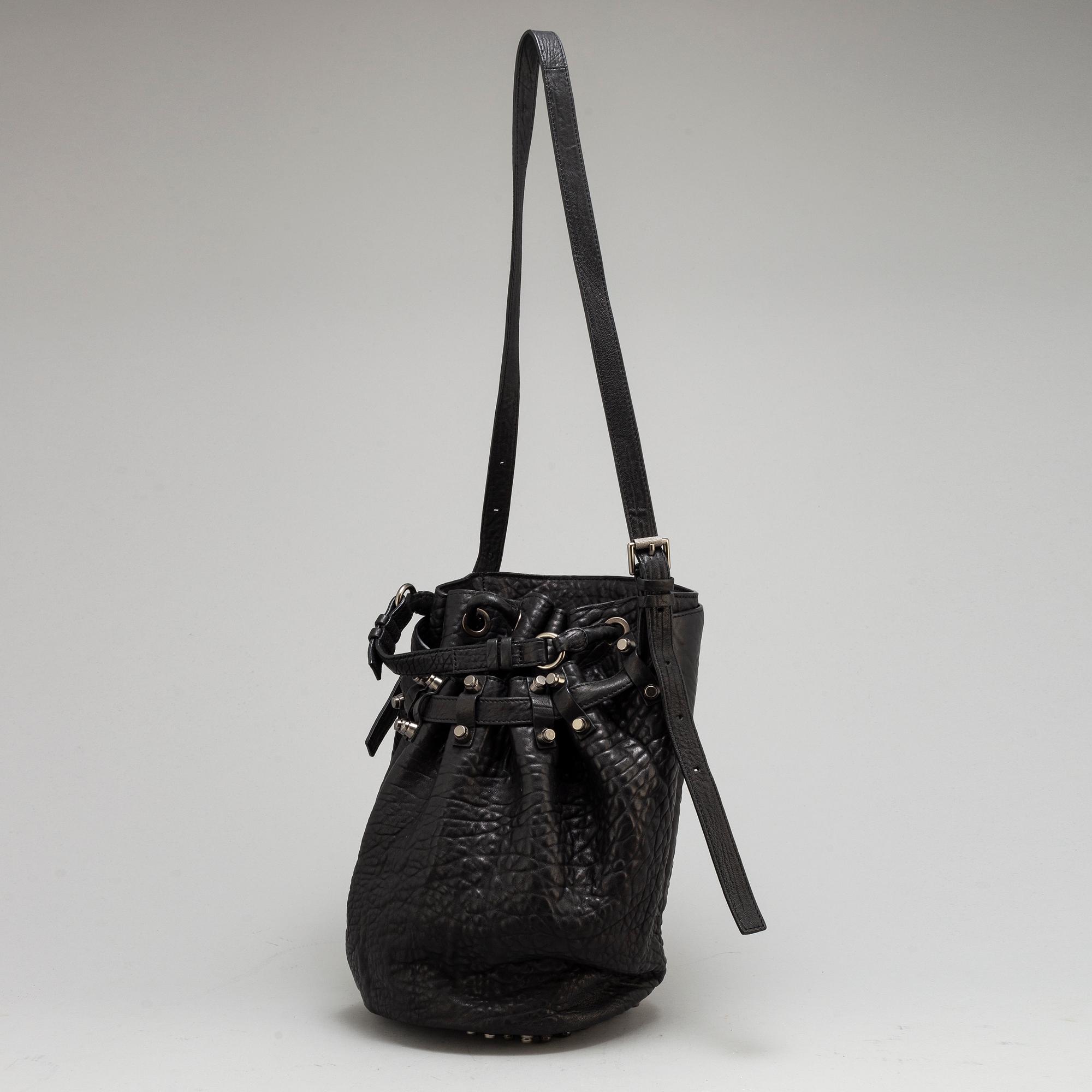ALEXANDER WANG Diego leather and studs bucket bag. Bukowskis