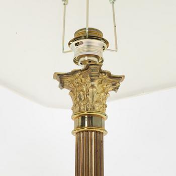 A pair of brass Empire style table lamps, 20th Century.