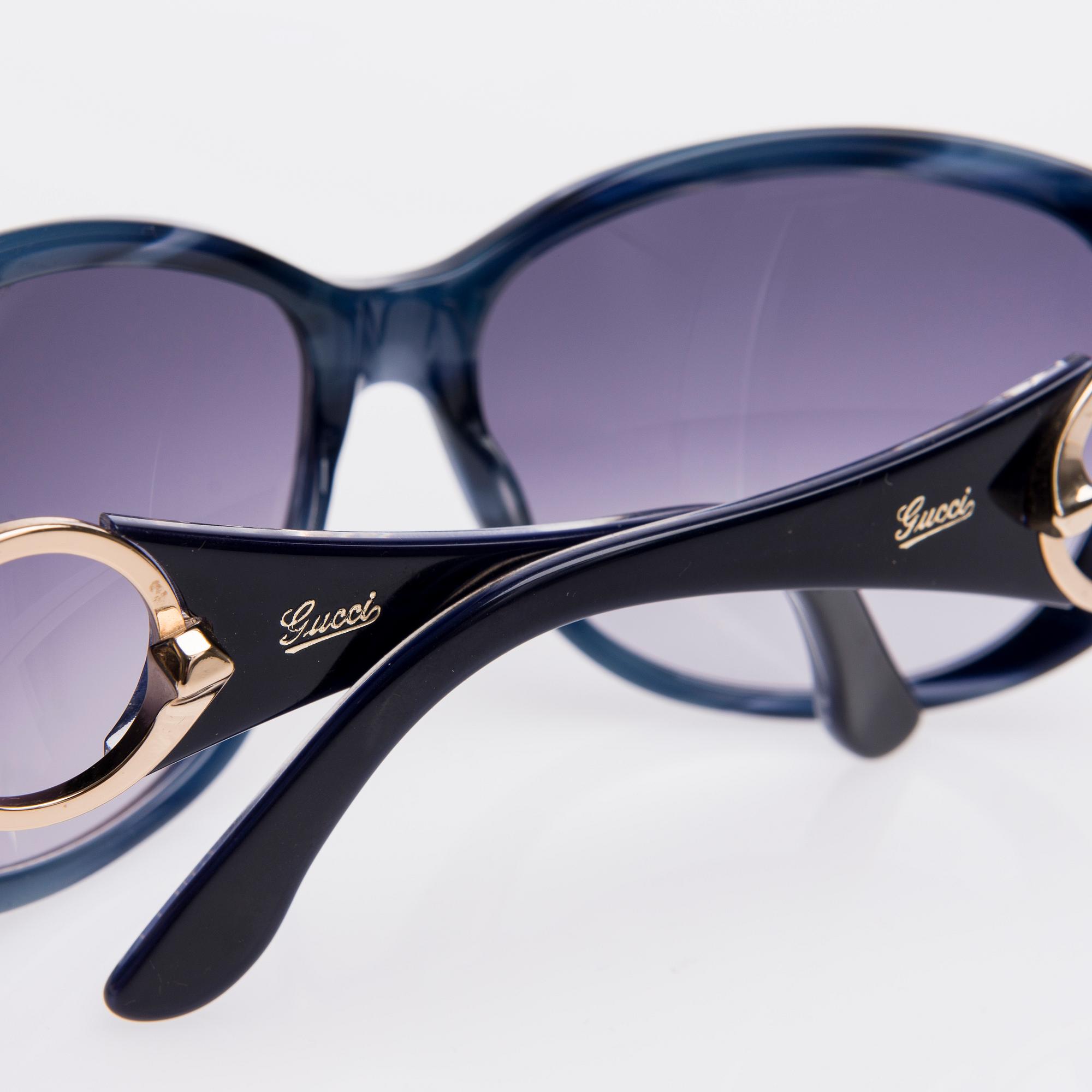 AURINKOLASIT, Gucci.