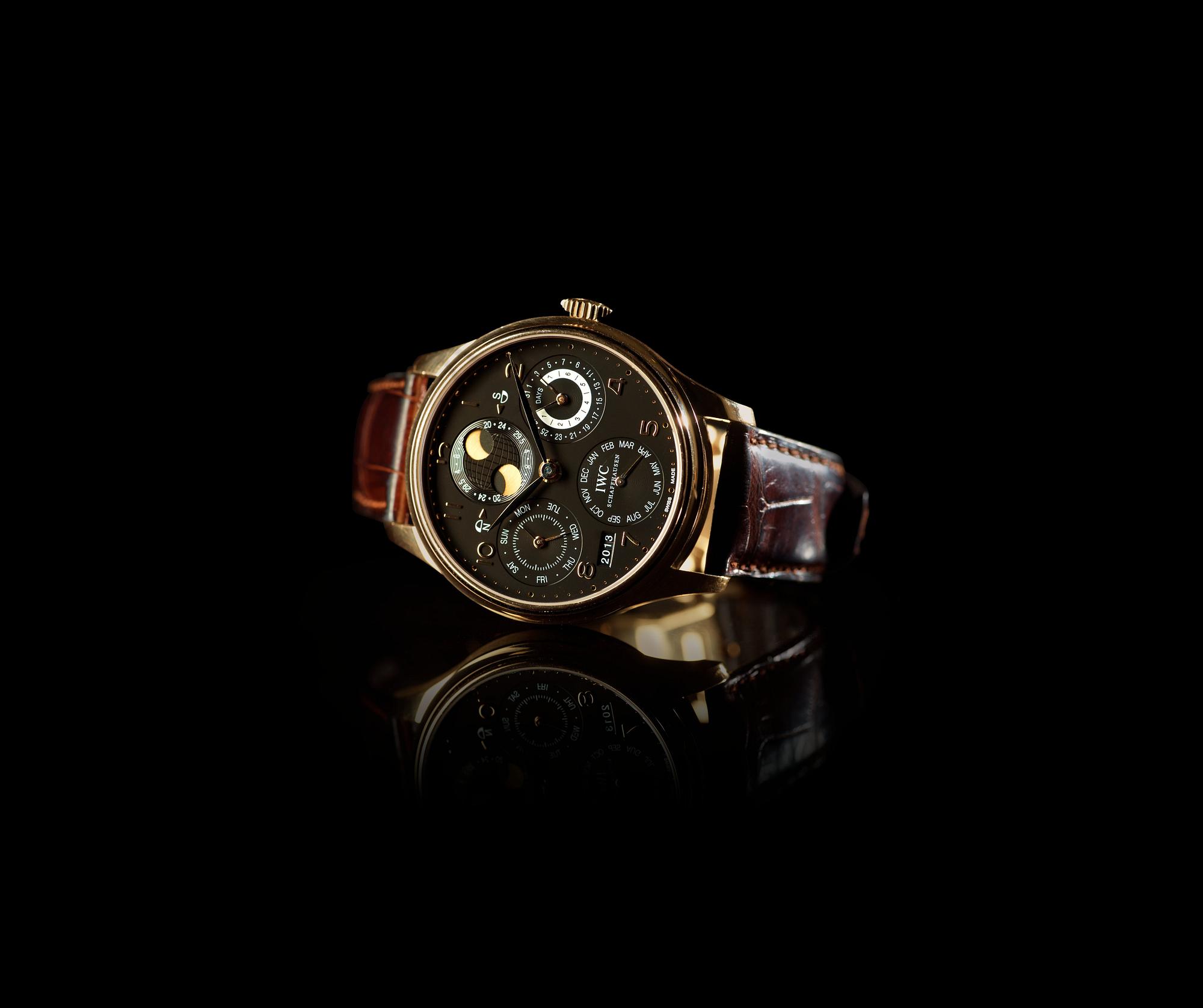 IWC - Portuguese Perpetual Calendar. Automatic. Gold / leather strap. 46mm.