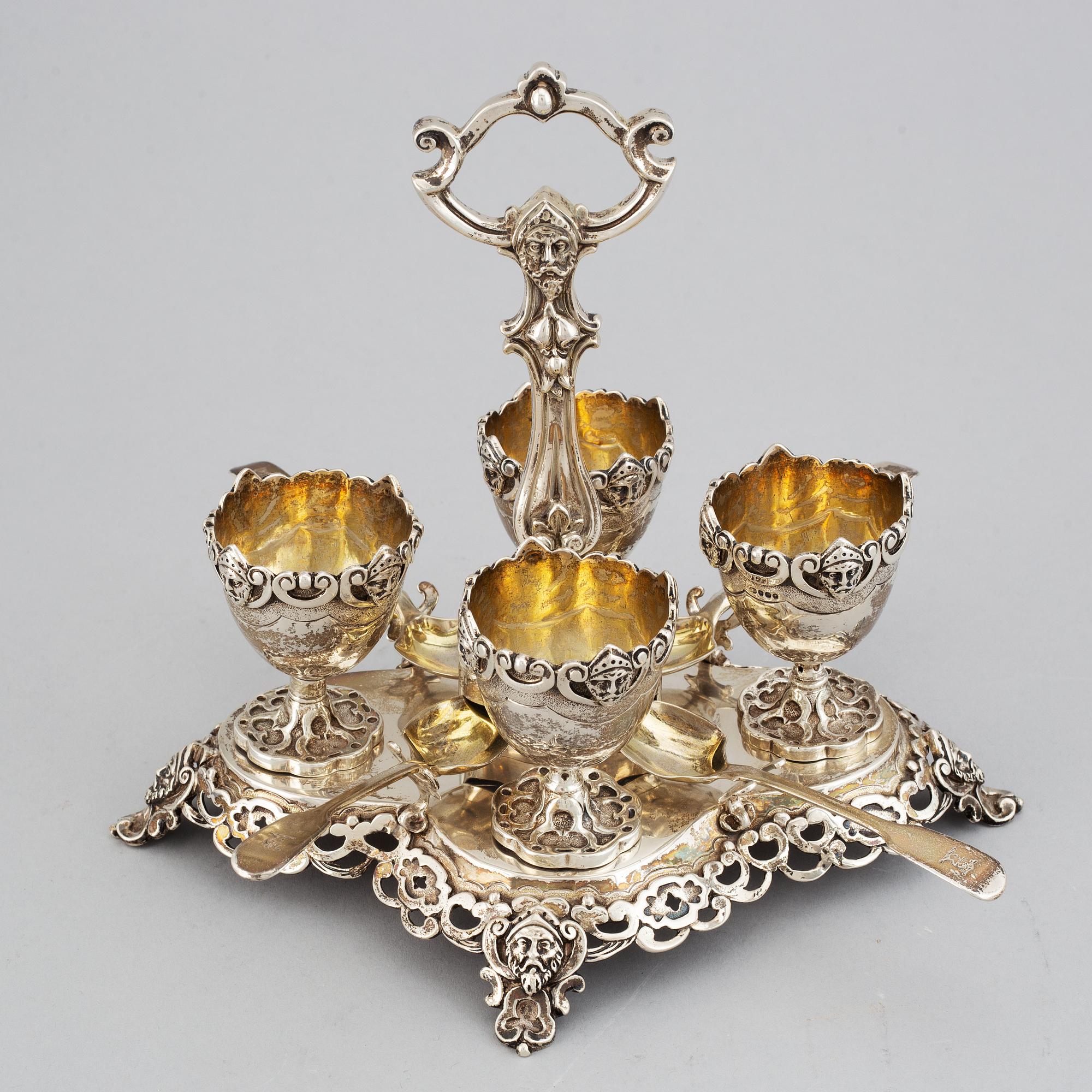 An English silver-gilt egg cruet set, mark of James Charles Edington, London 1857.