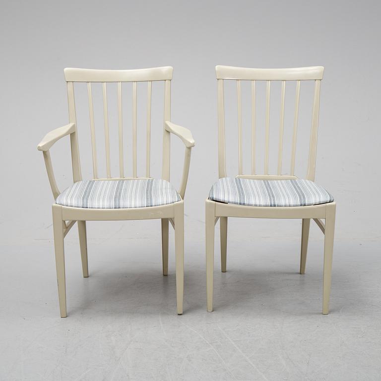 A dining table with two armchairs and six chairs by Carl Malmsten for Bodafors.