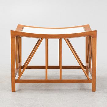 Josef Frank, a model 1063 cherry wood stool, Firma Svenskt Tenn, 21st Century.