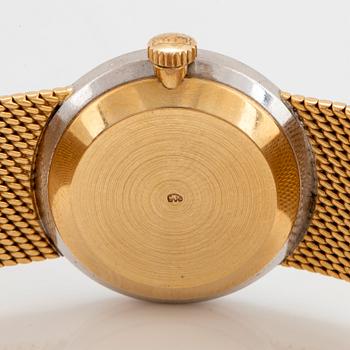 A Chopard wrist watch in 18K gold set with eight-cut diamonds.