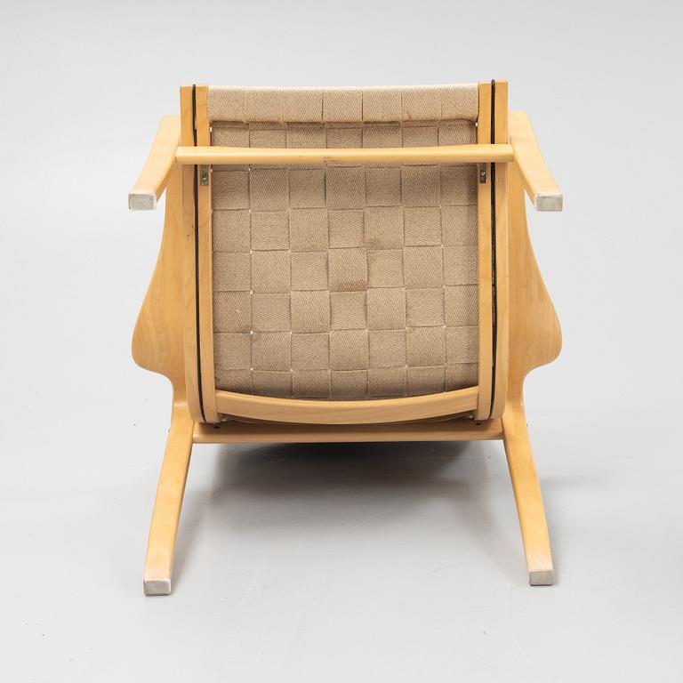 A pair of lounge chairs from Källemo.