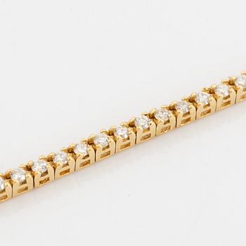 Brilliant cut diamond tennis bracelet.