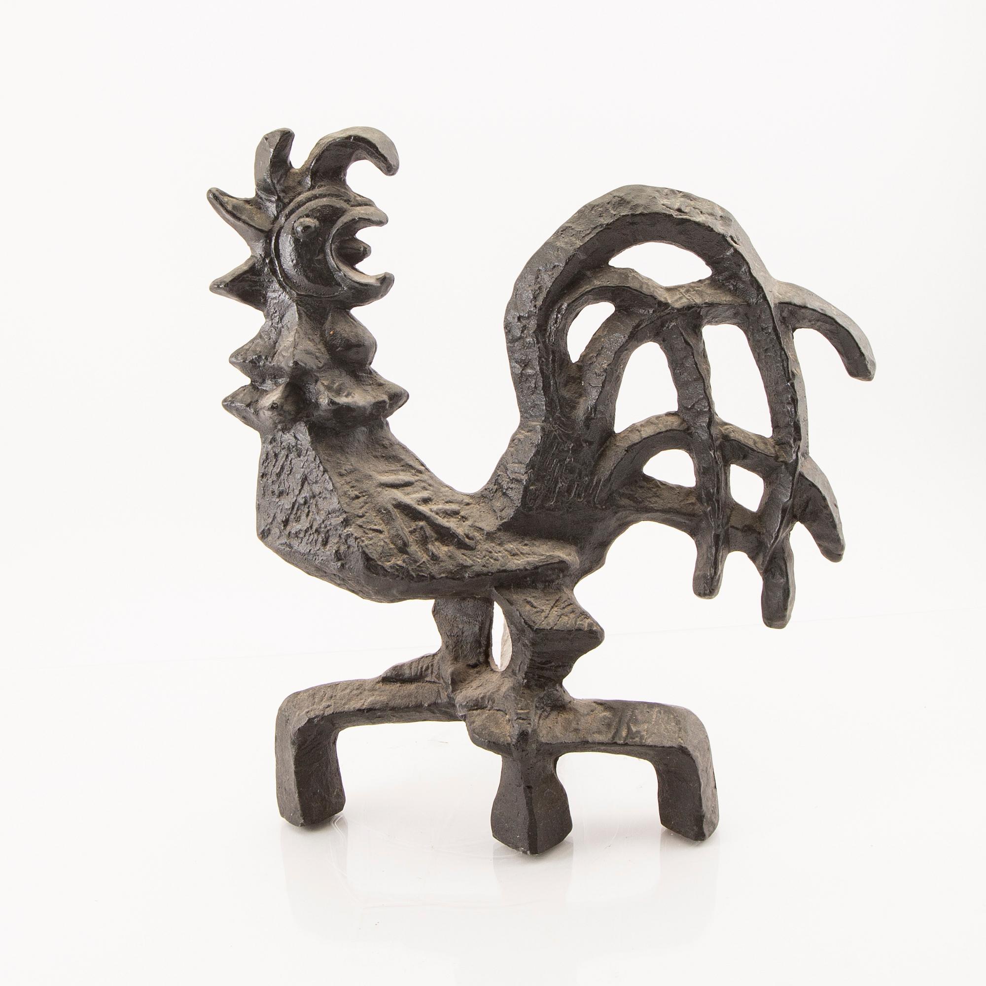 An Olle Hermansson cast iron firedog Husqvarna 1960s.