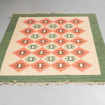 A carpet, flat weave, ca 227,5 x 163,5-168,5 cm, signed IH.