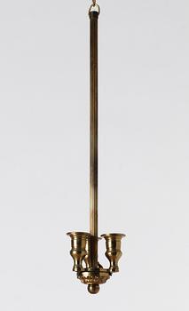 A 19th century three-light hanging lamp.