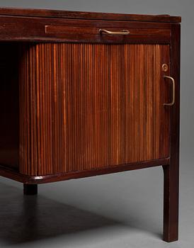 HANS J WEGNER, a mahogany desk model "A 1515" for Plan møbler, Denmark 1940-50's.