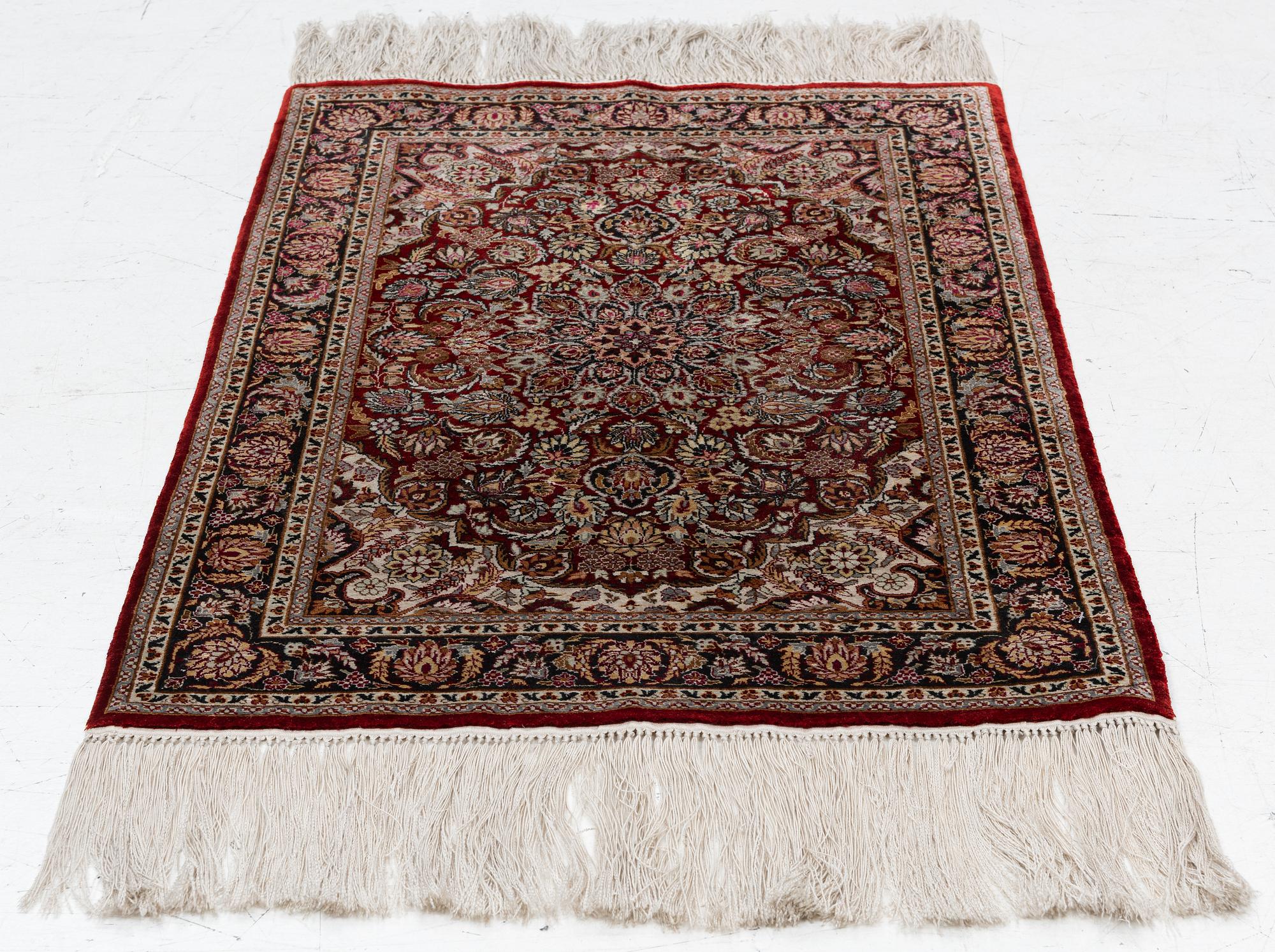Carpet, silk, approx. 95 x 63 cm.