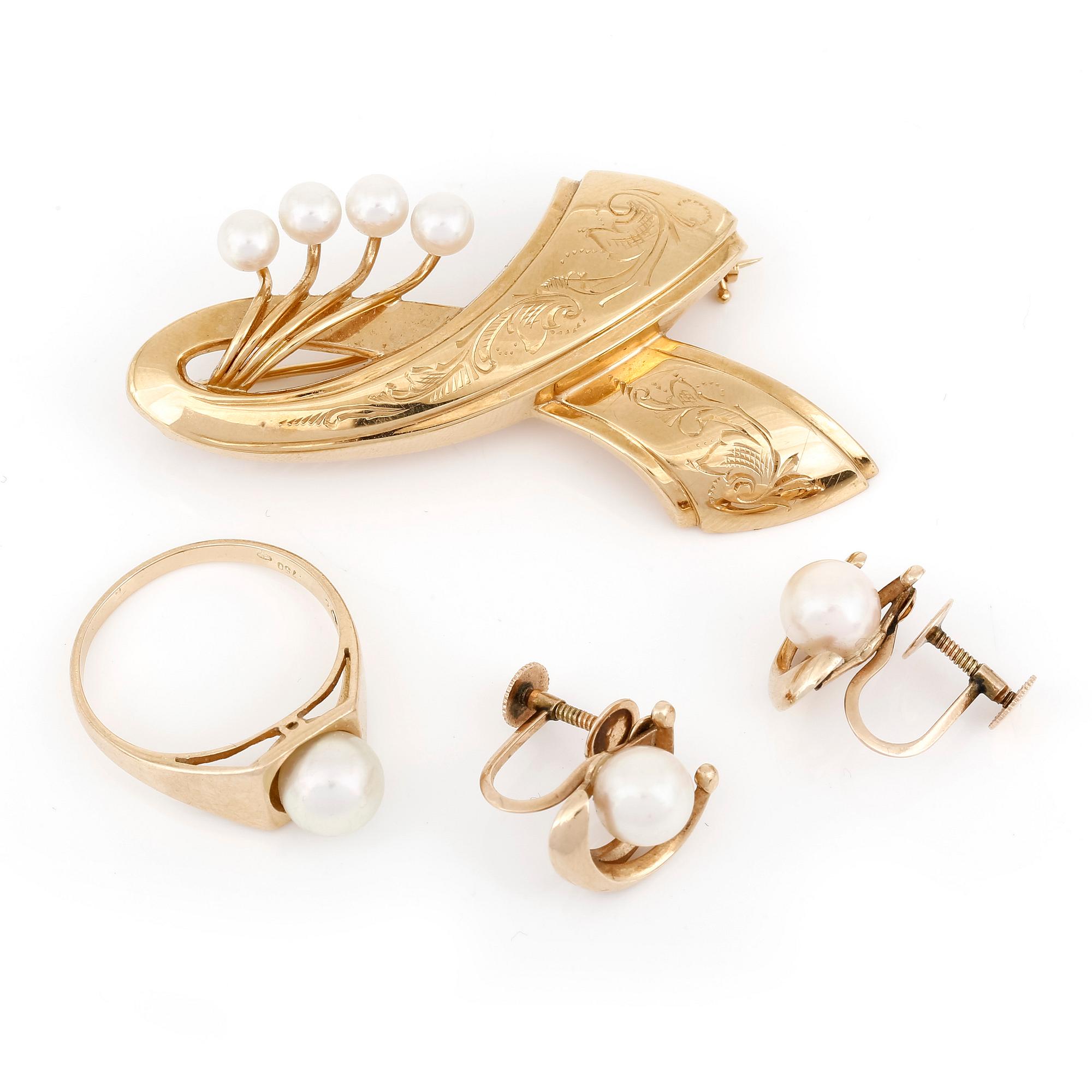 PARTI SMYCKEN, 3 delar, 14 respektive 18K guld, bland annat Gustaf Dahlgren & Co, Malmö, 1957. Vikt ca 13g.