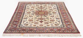 A semi-antique Isfahan rug, c. 225 x 143 cm.