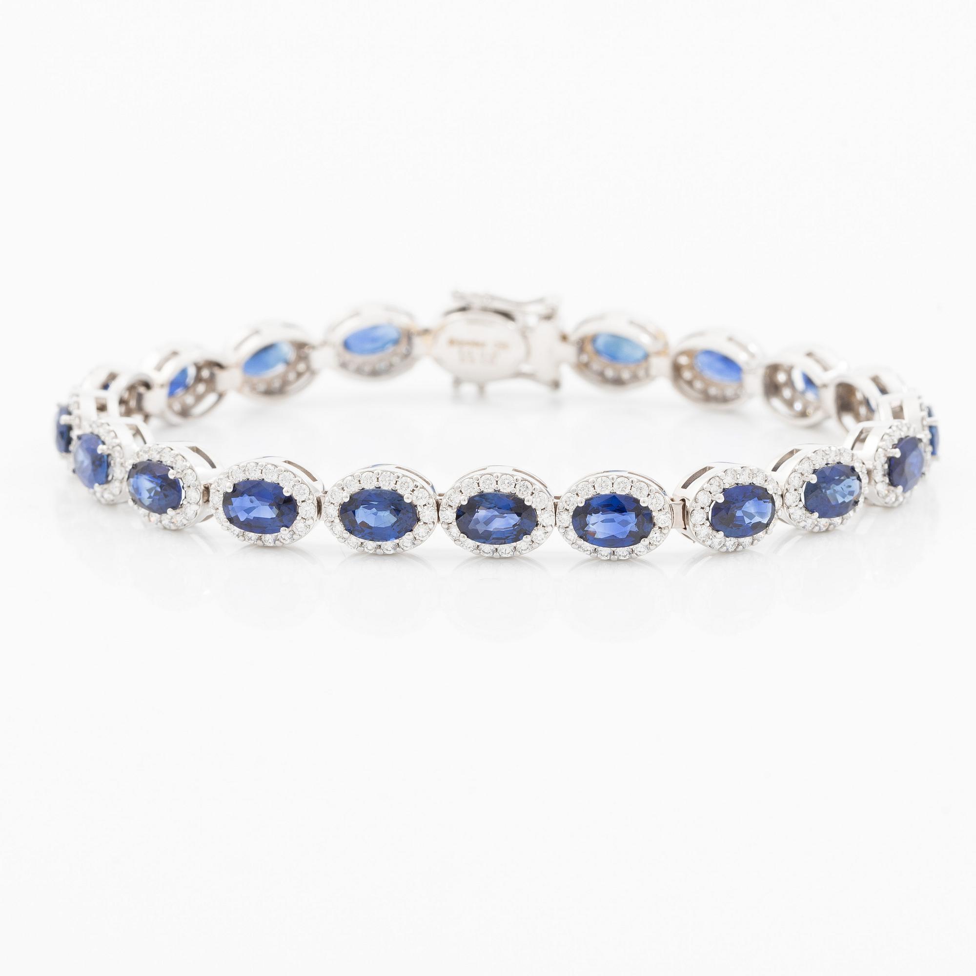 Bracelet 18K white gold with oval faceted sapphires and round brilliant-cut diamonds.