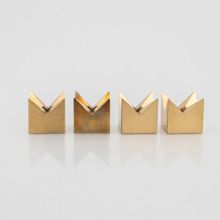 Pierre Forssell, four brass candle holders, Skultuna, Sweden.