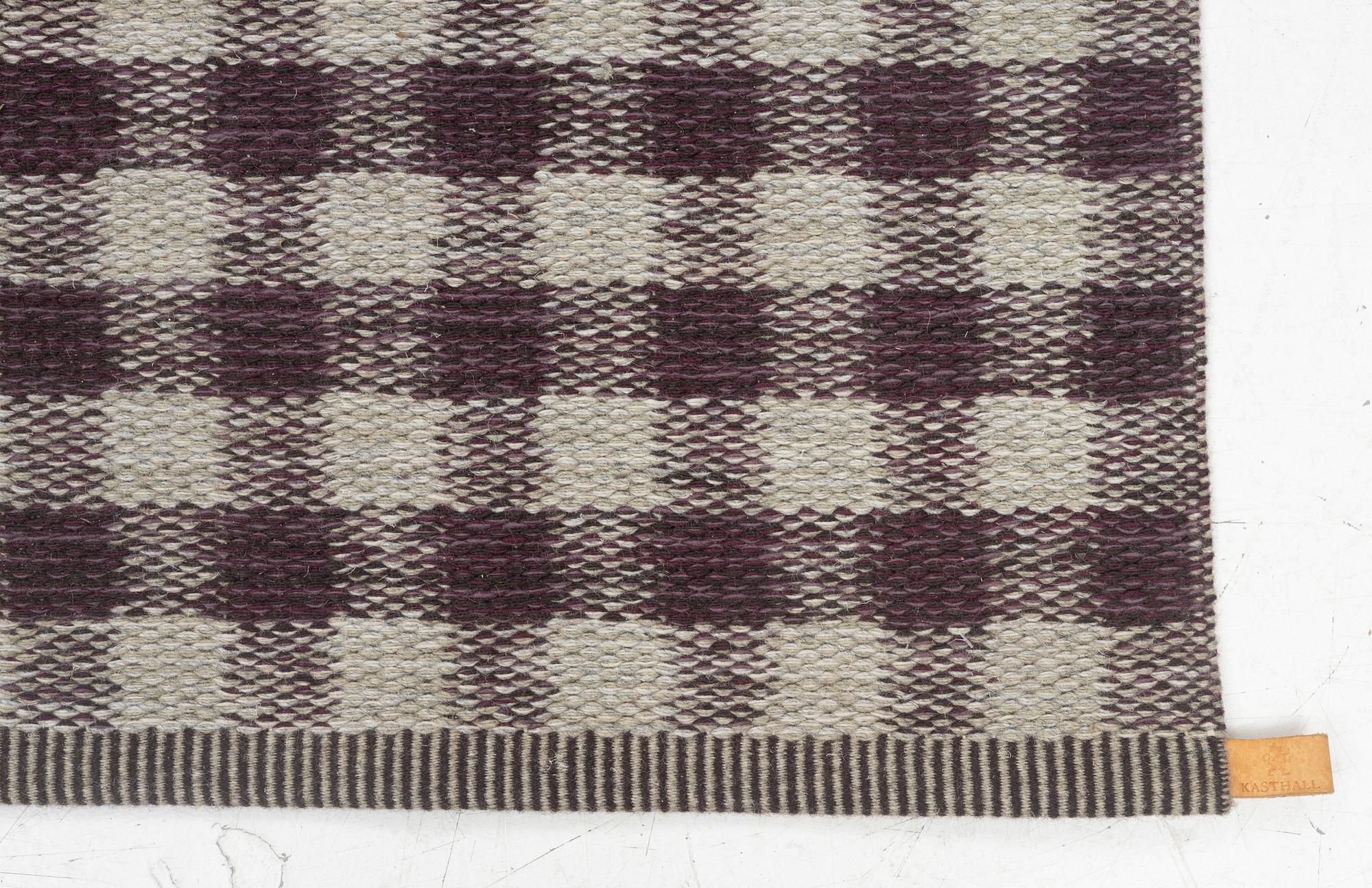 A flat weave "Vichy" carpet from Kasthall, c. 198 x 136 cm.