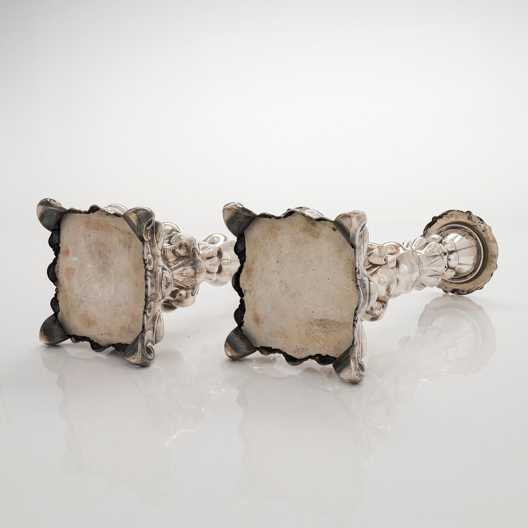 A pair of baroque style silver candlesticks, Hopeatehdas Oy, Helsinki 1947.